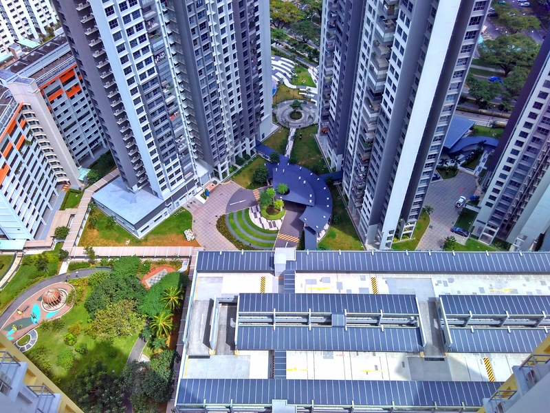 Bird's eye view of residential area of Clementi, Singapore with multistorey apartments, walkways and gardens