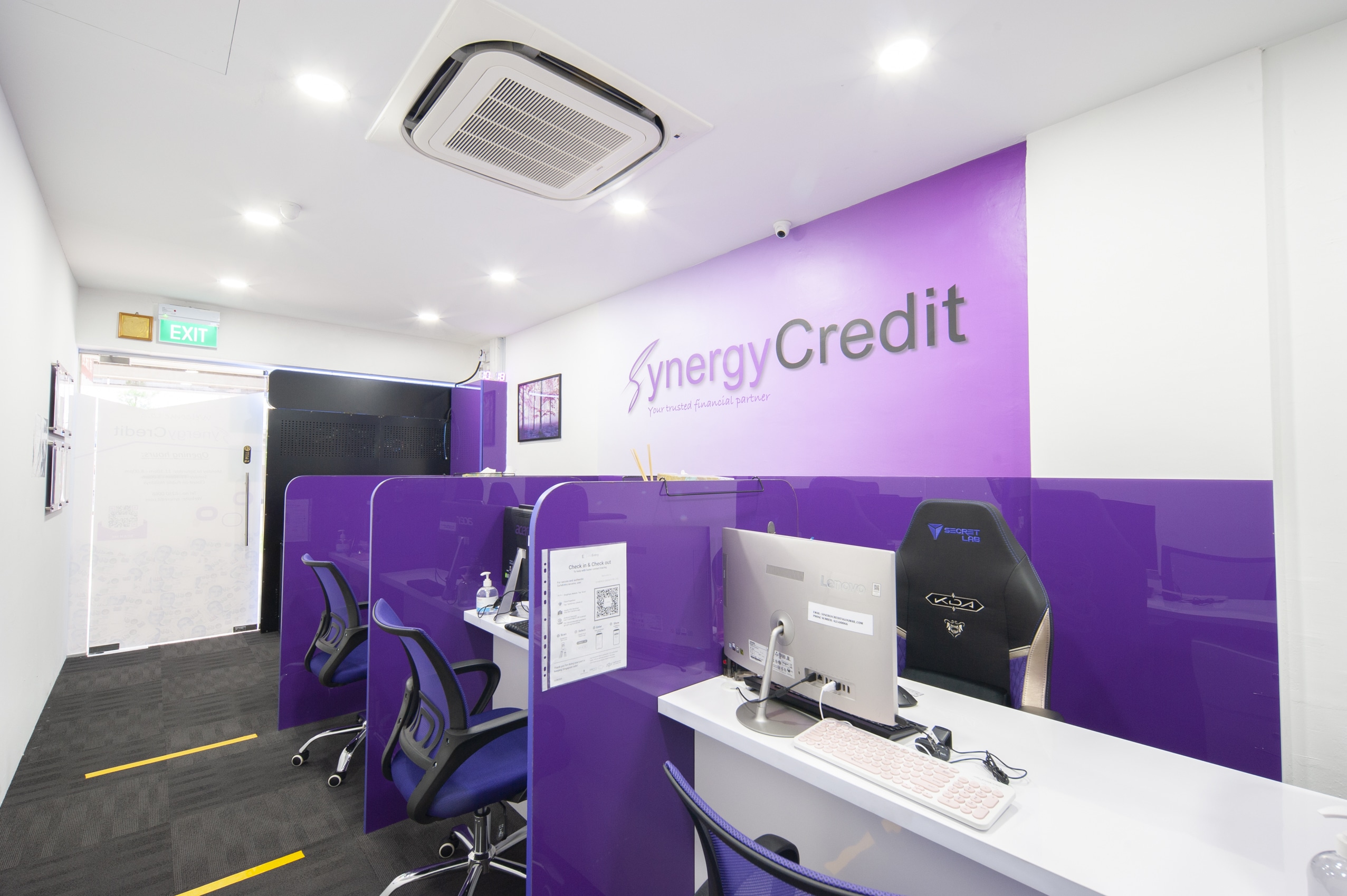 Loan officers' counters at Synergy Credit's legal money lender office in Clementi