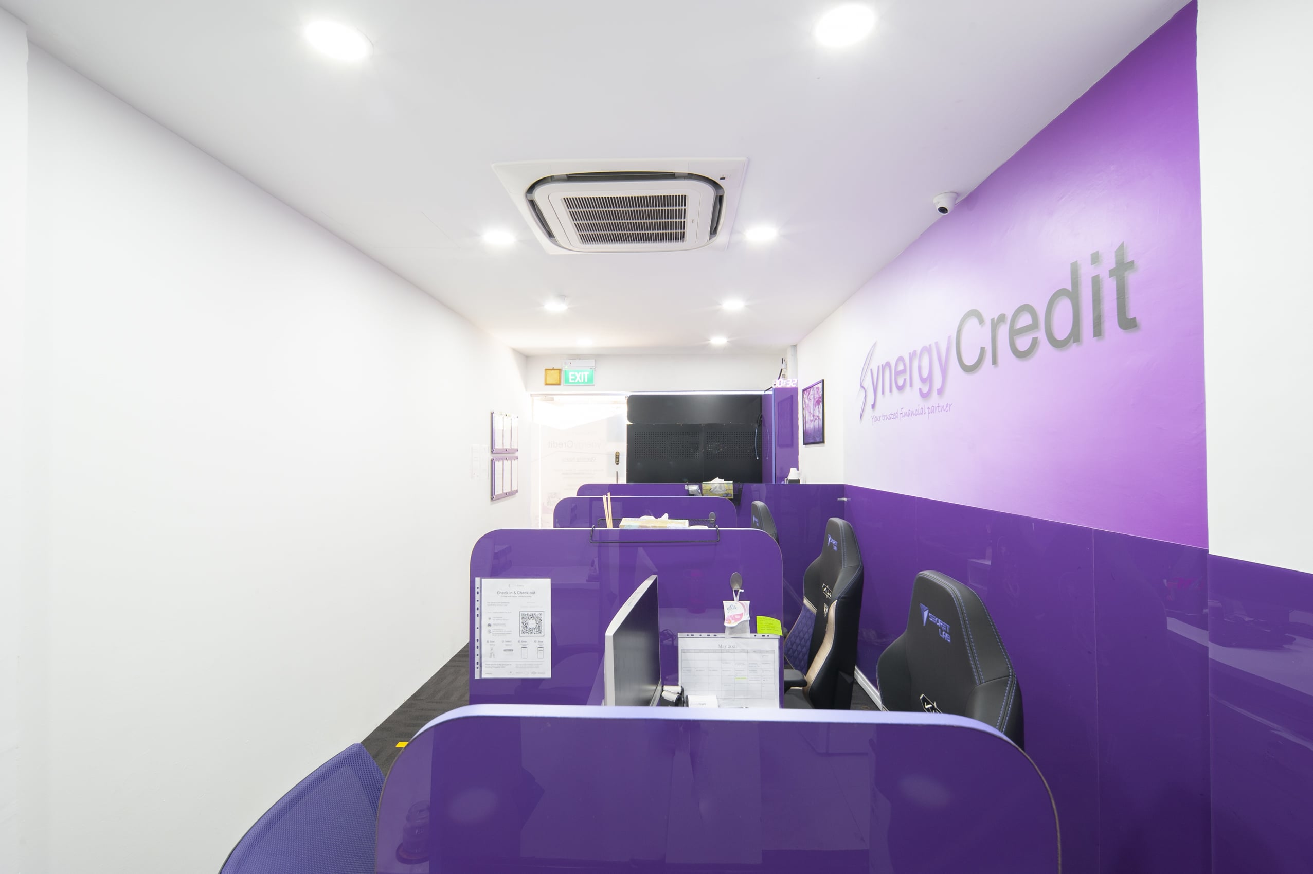 Loan officers' counters at Synergy Credit's loan company in Clementi, Singapore